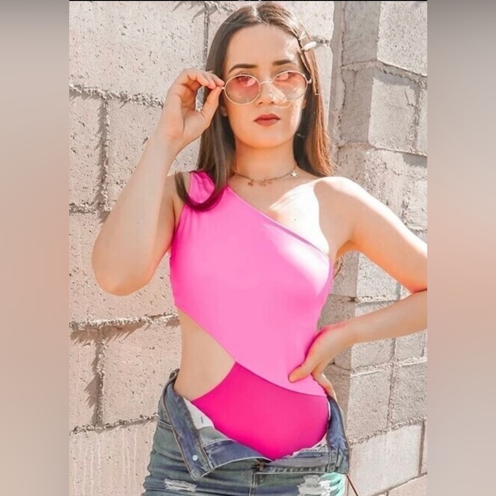 BNWOT Hot Pink colorblock swimsuit, with asymmetrical neckline. - Picture 2 of 2